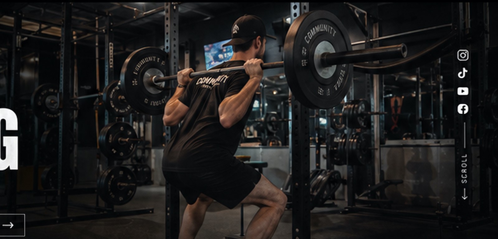 Barbell squat training at Community Skate Club gym